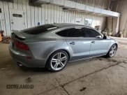 ✅ 2014 Audi A7 Premium Plus • VIN: WAUWGAFC4EN023348 • Лот: 86302535. Опубликован ранее на Copart с пробегом 116 685 миль. Бесплатный доступ к архиву аукционных продаж из США и подробный отчёт об истории автомобиля на DreamBid. Изображение 3.