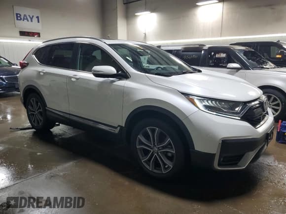 ✅ 2021 Honda CR-V Touring • VIN: 2HKRW2H97MH649971 • Lot: 93375235. Listed on Copart with 100,965 mi. Free auction sales archive from the USA and detailed vehicle history report at DreamBid. Image 4.