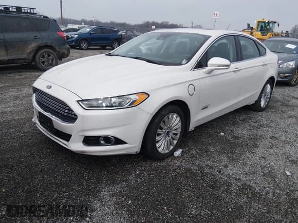✅ 2014 Ford Fusion Titanium • VIN: 3FA6P0SU6ER397622 • Lot: 43816342. Listed on IAAI with 121,145 mi. Free auction sales archive from the USA and detailed vehicle history report at DreamBid. Image 2.