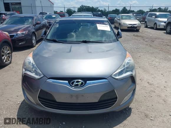 2012 Hyundai Veloster w/Black Int with VIN KMHTC6ADXCU061325, listed as a IAAI auction lot 42556398 with 122,954 mi miles and . Bid and sale history available at DreamBid. Image 6.