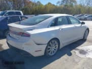 ✅ 2015 Lincoln MKZ Hybrid • VIN: 3LN6L2LUXFR607880 • Lot: 43657969. Wystawiony na IAAI z przebiegiem 225 419 mil. Bezpłatny archiwum sprzedaży aukcyjnych z USA i szczegółowy raport historii pojazdu na DreamBid. Zdjęcie 4.