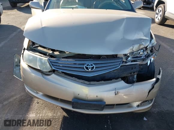 ✅ 2002 Toyota Solara SE • VIN: 2T1CF28P82C555053 • Lot: 41414314. Listed on IAAI with 115,444 mi. Free auction sales archive from the USA and detailed vehicle history report at DreamBid. Image 6.