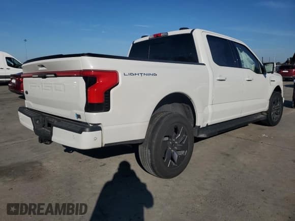 ✅ 2023 Ford F-150 Lightning Lariat • VIN: 1FTVW1EV0PWG12849 • Lot: 87083755. Listed on Copart with 35,557 mi. Free auction sales archive from the USA and detailed vehicle history report at DreamBid. Image 3.