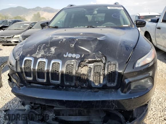 ✅ 2014 Jeep Cherokee Altitude • VIN: 1C4PJMCS1EW124461 • Lot: 62885365. Listed on Copart with 99,760 mi. Free auction sales archive from the USA and detailed vehicle history report at DreamBid. Image 5.