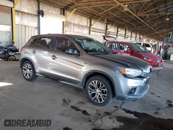 2018 Mitsubishi Outlander SE with VIN JA4AP3AW8JZ036143, listed as a Copart auction lot 84583595 with 162,199 mi miles and Salvage title. Bid and sale history available at DreamBid. Image 4.