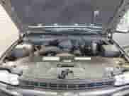 2000 Chevrolet Silverado 1500 LS z VIN 1GCEK19T1YE336600, wystawiony jako IAAI lot #42383410 z przebiegiem 64 920 mil mil oraz . Historia ofert i sprzedaży dostępna na DreamBid. Obrazek 10.