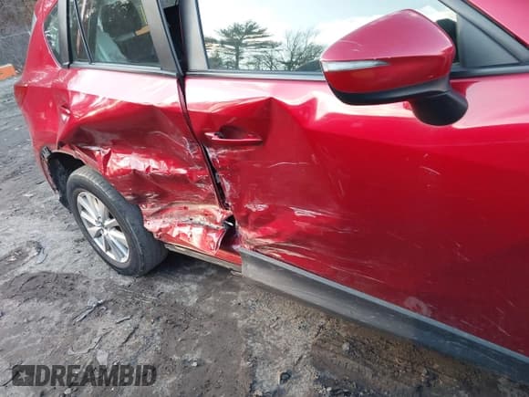 ✅ 2016 Mazda CX-5 Sport • VIN: JM3KE4BY3G0602140 • Lot: 43855403. Listed on IAAI with 169,571 mi. Free auction sales archive from the USA and detailed vehicle history report at DreamBid. Image 12.