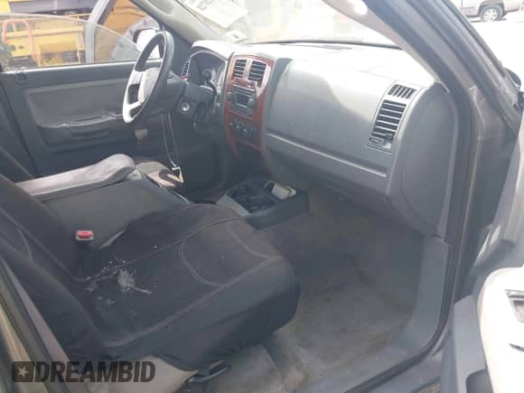 2006 Dodge Dakota SLT with VIN 1D7HE48N06S580705, listed as a IAAI auction lot 42120728 with 206,420 mi miles and . Bid and sale history available at DreamBid. Image 5.