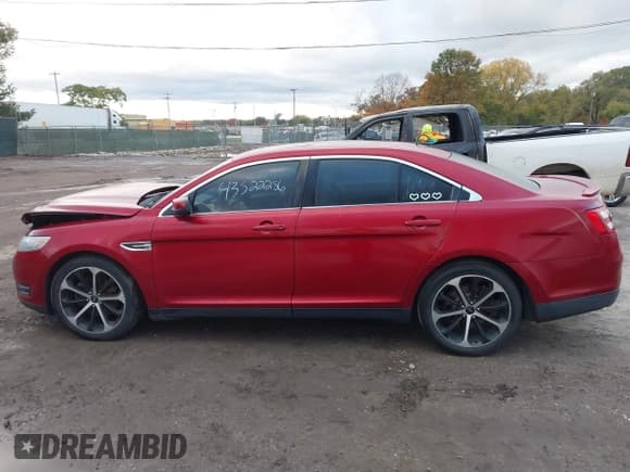 ✅ 2014 Ford Taurus SEL • VIN: 1FAHP2E81EG117230 • Lot: 43522256. Listed on IAAI with 184,269 mi. Free auction sales archive from the USA and detailed vehicle history report at DreamBid. Image 14.
