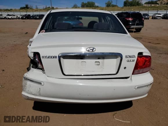 2002 Hyundai Sonata GLS с VIN KMHWF35H12A624164, выставлен на аукционе Copart как лот 72606564 с пробегом 89 040 миль миль и На запчасти • Non repairable. История ставок и продаж доступна на DreamBid. Изображение 6.