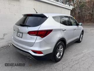 ✅ 2018 Hyundai Santa Fe 2.4L • VIN: 5XYZT3LB6JG565927 • Лот: 92522215. Опубликован ранее на Copart с пробегом 116 009 миль. Бесплатный доступ к архиву аукционных продаж из США и подробный отчёт об истории автомобиля на DreamBid. Изображение 4.