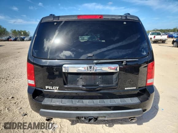 ✅ 2009 Honda Pilot Touring • VIN: 5FNYF38999B020221 • Lot: 82249115. Listed on Copart with 193,706 mi. Free auction sales archive from the USA and detailed vehicle history report at DreamBid. Image 6.