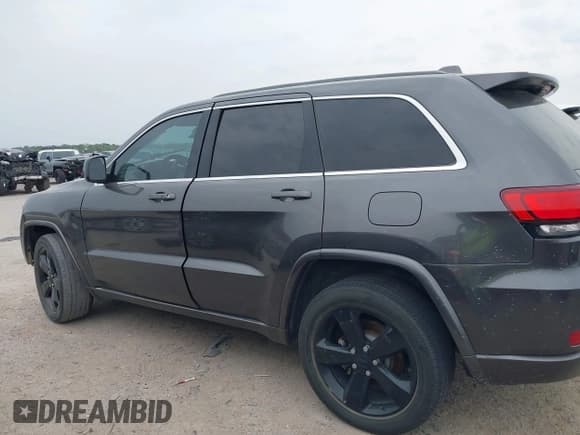 ✅ 2015 Jeep Grand Cherokee Altitude • VIN: 1C4RJEAG3FC219782 • Lot: 42076212. Listed on IAAI with 194,910 mi. Free auction sales archive from the USA and detailed vehicle history report at DreamBid. Image 14.