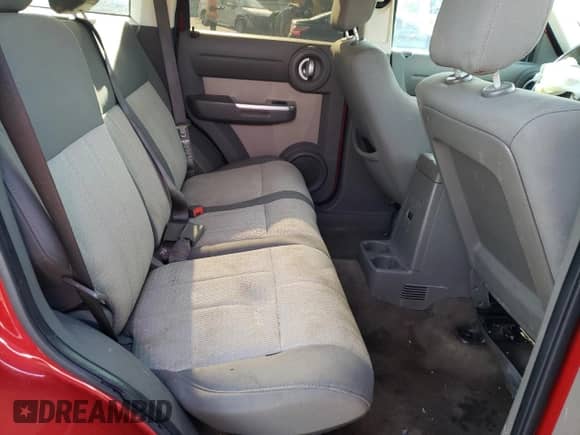 2007 Dodge Nitro SLT с VIN 1D8GT58K77W614187, выставлен на аукционе Copart как лот 65040384 с пробегом 237 149 миль миль и На запчасти • Non repairable. История ставок и продаж доступна на DreamBid. Изображение 12.