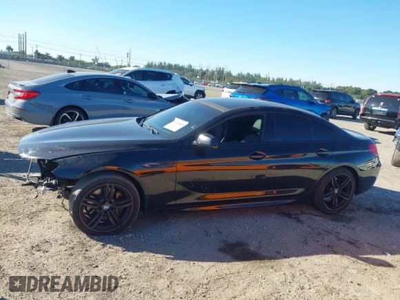 ✅ 2015 BMW 6 Series 640i xDrive • VIN: WBA6B8C55FD453166 • Lot: 41296865. Wystawiony na IAAI z przebiegiem 103 816 mil. Bezpłatny archiwum sprzedaży aukcyjnych z USA i szczegółowy raport historii pojazdu na DreamBid. Zdjęcie 15.