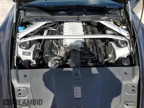 ✅ 2013 Aston Martin Vantage • VIN: SCFEKBBK1DGD17118 • Lot: 60636224. Wystawiony na Copart z przebiegiem 50 591 mil. Bezpłatny archiwum sprzedaży aukcyjnych z USA i szczegółowy raport historii pojazdu na DreamBid. Zdjęcie 11.