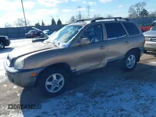 2002 Hyundai Santa Fe GLS z VIN KM8SC73D62U316002, wystawiony jako IAAI lot #41249855 z przebiegiem Nie podano mil oraz . Historia ofert i sprzedaży dostępna na DreamBid. Obrazek 2.