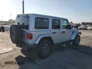 ✅ 2024 Jeep Wrangler Sahara • VIN: 1C4PJXEN2RW129215 • Lot: 69625995. Listed on Copart with 44,323 mi. Free auction sales archive from the USA and detailed vehicle history report at DreamBid. Image 3.