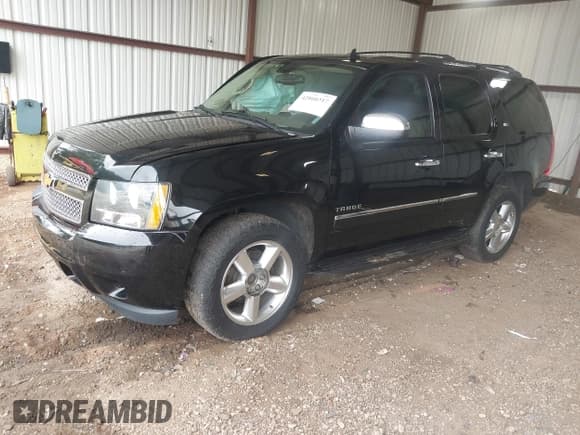 ✅ 2013 Chevrolet Tahoe LTZ • VIN: 1GNSCCE03DR122449 • Lot: 42860317. Listed on IAAI with 181,518 mi. Free auction sales archive from the USA and detailed vehicle history report at DreamBid. Image 2.