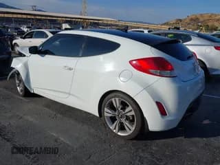 ✅ 2013 Hyundai Veloster w/Black Int • VIN: KMHTC6AD5DU101733 • Lot: 41425260. Wystawiony na IAAI z przebiegiem 139 500 mil. Bezpłatny archiwum sprzedaży aukcyjnych z USA i szczegółowy raport historii pojazdu na DreamBid. Zdjęcie 3.