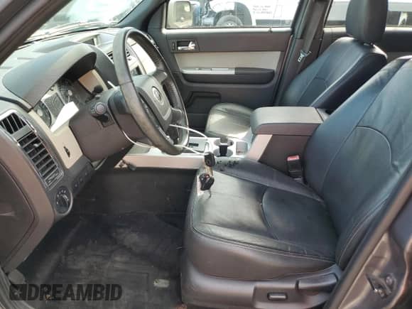 2010 Mercury Mariner Premier с VIN 4M2CN9HG3AKJ25661, выставлен на аукционе Copart как лот 69384945 с пробегом 154 199 миль миль и Списание • Salvage title. История ставок и продаж доступна на DreamBid. Изображение 7.