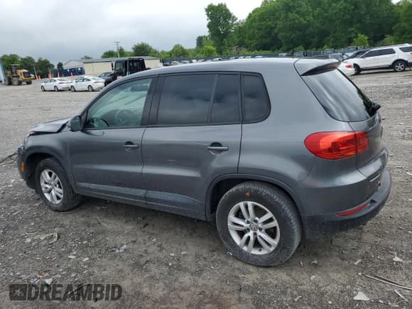 ✅ 2013 Volkswagen Tiguan S • VIN: WVGAV3AX6DW597379 • Лот: 56386515. Опубликован ранее на Copart с пробегом 100 415 миль. Бесплатный доступ к архиву аукционных продаж из США и подробный отчёт об истории автомобиля на DreamBid. Изображение 2.