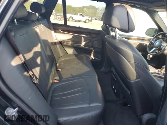 ✅ 2015 BMW X5 xDrive50i • VIN: 5UXKR6C56F0J74185 • Лот: 81572675. Опубликован ранее на Copart с пробегом 121 722 миль. Бесплатный доступ к архиву аукционных продаж из США и подробный отчёт об истории автомобиля на DreamBid. Изображение 11.