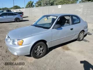 2001 Hyundai Accent GS with VIN KMHCG35CX1U138406, listed as a Copart auction lot 81693065 with 100,605 mi miles and Salvage title. Bid and sale history available at DreamBid. Image 1.