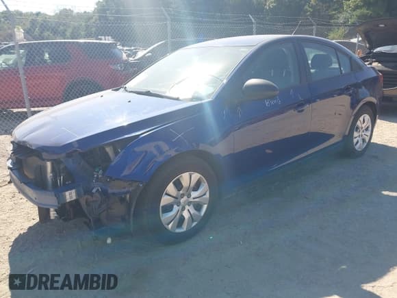 ✅ 2013 Chevrolet Cruze LS • VIN: 1G1PA5SH7D7185147 • Lot: 43296228. Listed on IAAI with 127,952 mi. Free auction sales archive from the USA and detailed vehicle history report at DreamBid. Image 2.
