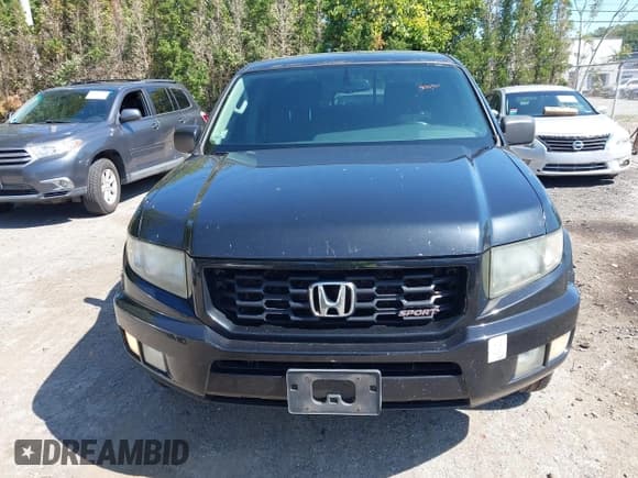✅ 2013 Honda Ridgeline Sport • VIN: 5FPYK1F73DB007952 • Lot: 43210748. Listed on IAAI with 273,921 mi. Free auction sales archive from the USA and detailed vehicle history report at DreamBid. Image 12.