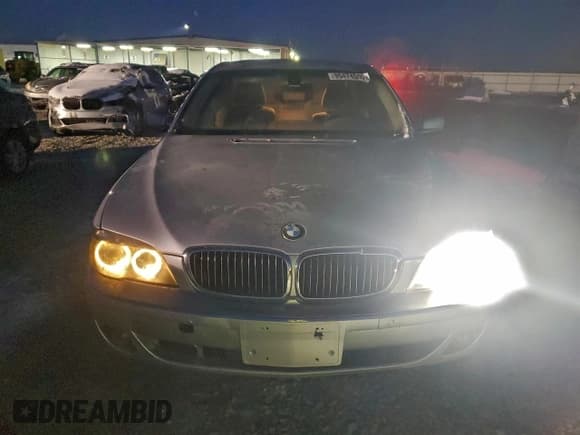 ✅ 2006 BMW 7 Series 750i • VIN: WBAHL83536DT05152 • Лот: 95474505. Опубликован ранее на Copart с пробегом 106 153 миль. Бесплатный доступ к архиву аукционных продаж из США и подробный отчёт об истории автомобиля на DreamBid. Изображение 5.
