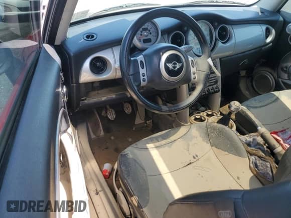 2003 MINI Hardtop with VIN WMWRC334X3TC47642, listed as a Copart auction lot 63665615 with Not provided miles and Salvage title. Bid and sale history available at DreamBid. Image 8.