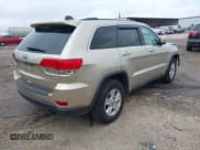 ✅ 2014 Jeep Grand Cherokee Laredo • VIN: 1C4RJEAG1EC149343 • Лот: 43602022. Опубликован ранее на IAAI с пробегом 100 322 миль. Бесплатный доступ к архиву аукционных продаж из США и подробный отчёт об истории автомобиля на DreamBid. Изображение 4.