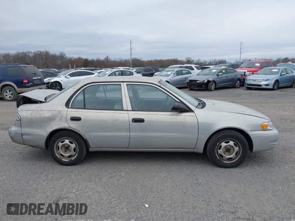 ✅ 1999 Toyota Corolla VE • VIN: 2T1BR12E1XC128924 • Lot: 43671058. Listed on IAAI with 270,679 mi. Free auction sales archive from the USA and detailed vehicle history report at DreamBid. Image 13.