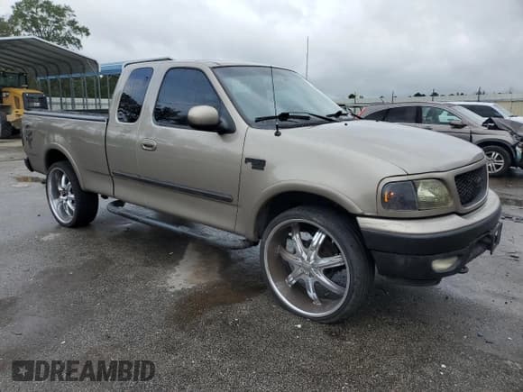 ✅ 2001 Ford F-150 XL • VIN: 2FTRX18L31CA42275 • Lot: 85001215. Listed on Copart with 313,985 mi. Free auction sales archive from the USA and detailed vehicle history report at DreamBid. Image 4.