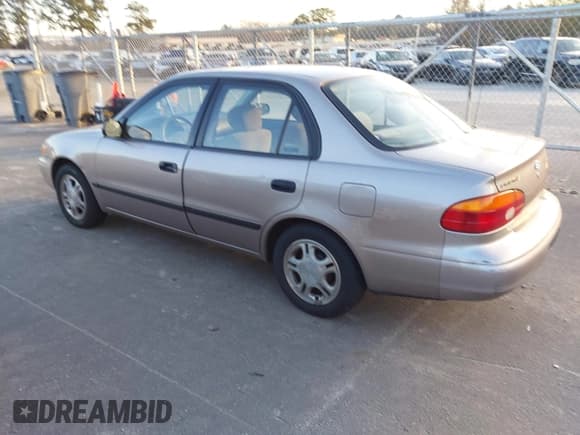 ✅ 1998 Chevrolet Prizm • VIN: 1Y1SK548XWZ417142 • Lot: 43871972. Listed on IAAI with 220,307 mi. Free auction sales archive from the USA and detailed vehicle history report at DreamBid. Image 3.