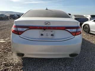 2014 Hyundai Azera с VIN KMHFG4JG4EA346316, выставлен на аукционе Copart как лот 86545734 с пробегом 155 590 миль миль и Списание • Salvage title. История ставок и продаж доступна на DreamBid. Изображение 6.