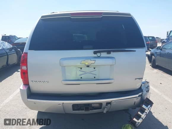 2011 Chevrolet Tahoe LTZ with VIN 1GNSKCE03BR368837, listed as a IAAI auction lot 42741642 with 166,196 mi miles and . Bid and sale history available at DreamBid. Image 16.