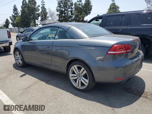 ✅ 2014 Volkswagen Eos Executive • VIN: WVWFW8AHXEV004529 • Лот: 58532495. Опубликован ранее на Copart с пробегом 98 789 миль. Бесплатный доступ к архиву аукционных продаж из США и подробный отчёт об истории автомобиля на DreamBid. Изображение 2.