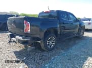 ✅ 2015 GMC Canyon 2WD SLE • VIN: 1GTG5BE32F1231709 • Lot: 42143190. Listed on IAAI with 96,063 mi. Free auction sales archive from the USA and detailed vehicle history report at DreamBid. Image 4.