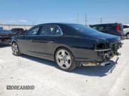 ✅ 2014 Bentley Flying Spur • VIN: SCBEC9ZA8EC088818 • Lot: 61191335. Wystawiony na Copart z przebiegiem 26 781 mil. Bezpłatny archiwum sprzedaży aukcyjnych z USA i szczegółowy raport historii pojazdu na DreamBid. Zdjęcie 2.