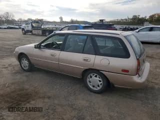 ✅ 1997 Ford Escort LX • VIN: 3FALP15P1VR154749 • Lot: 76805764. Listed on Copart with 259,405 mi. Free auction sales archive from the USA and detailed vehicle history report at DreamBid. Image 2.