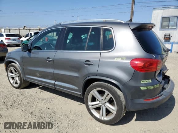 ✅ 2014 Volkswagen Tiguan S • VIN: WVGAV3AX8EW009418 • Lot: 61044445. Wystawiony na Copart z przebiegiem 100 302 mil. Bezpłatny archiwum sprzedaży aukcyjnych z USA i szczegółowy raport historii pojazdu na DreamBid. Zdjęcie 2.