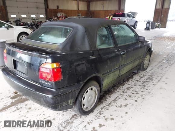 ✅ 1995 Volkswagen Cabriolet • VIN: WVWBC81E6SK001458 • Lot: 42732474. Listed on IAAI with 63,426 mi. Free auction sales archive from the USA and detailed vehicle history report at DreamBid. Image 4.