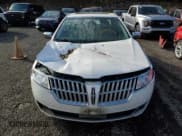 ✅ 2011 Lincoln MKZ • VIN: 3LNHL2GC7BR758664 • Lot: 86639775. Wystawiony na Copart z przebiegiem 166 619 mil. Bezpłatny archiwum sprzedaży aukcyjnych z USA i szczegółowy raport historii pojazdu na DreamBid. Zdjęcie 5.