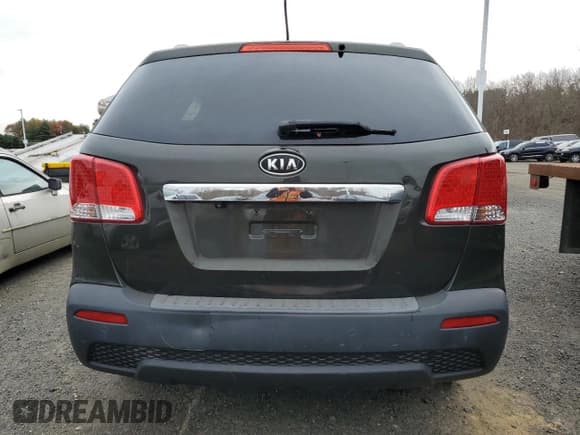 ✅ 2013 Kia Sorento LX • VIN: 5XYKTDA68DG318426 • Лот: 91254485. Опубликован ранее на Copart с пробегом 123 219 миль. Бесплатный доступ к архиву аукционных продаж из США и подробный отчёт об истории автомобиля на DreamBid. Изображение 6.