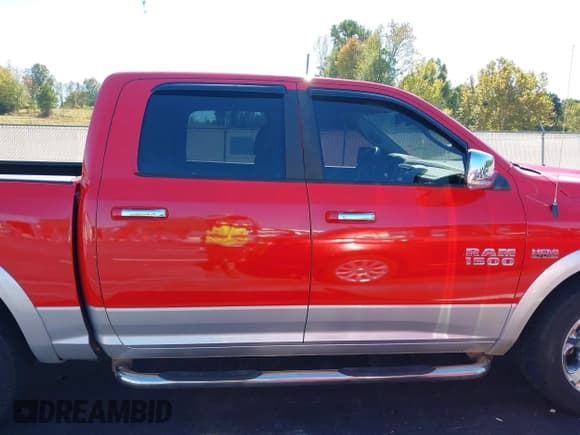 ✅ 2015 Ram 1500 Laramie • VIN: 1C6RR7NT7FS653115 • Lot: 43441542. Listed on IAAI with 148,784 mi. Free auction sales archive from the USA and detailed vehicle history report at DreamBid. Image 13.