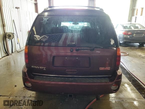 ✅ 2006 GMC Envoy SLE • VIN: 1GKET16S066151054 • Lot: 59432125. Listed on Copart with 198,267 mi. Free auction sales archive from the USA and detailed vehicle history report at DreamBid. Image 6.