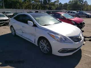 2017 Hyundai Azera Limited с VIN KMHFH4JG0HA581877, выставлен на аукционе Copart как лот 81221514 с пробегом 166 057 миль миль и Списание • Salvage title. История ставок и продаж доступна на DreamBid. Изображение 4.