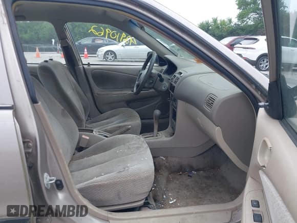 ✅ 1999 Toyota Corolla VE • VIN: 2T1BR12E3XC246635 • Lot: 42910962. Listed on IAAI with 252,704 mi. Free auction sales archive from the USA and detailed vehicle history report at DreamBid. Image 5.